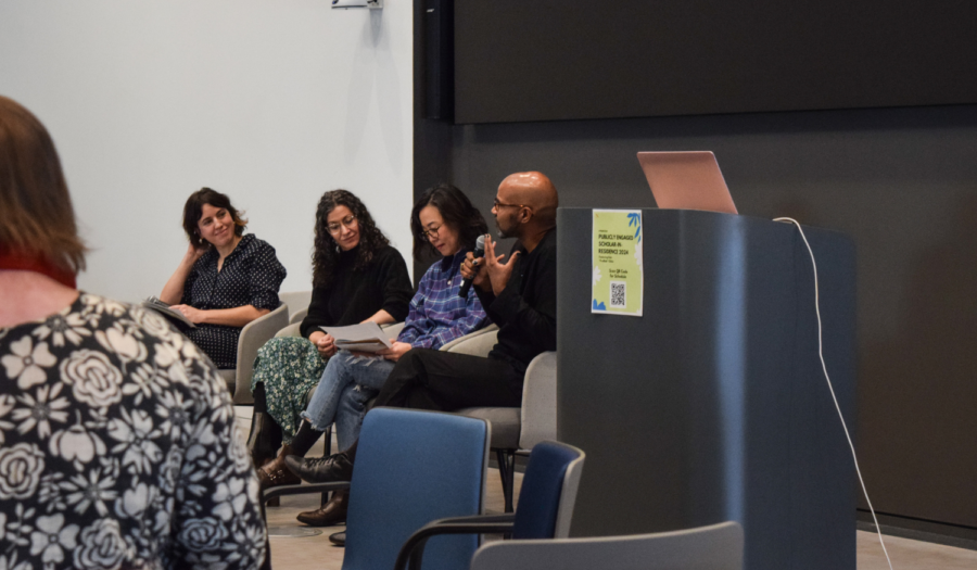 Photo shows five people participating in a panel discussion at PESIR 2024 in the EXP Northeastern venue.